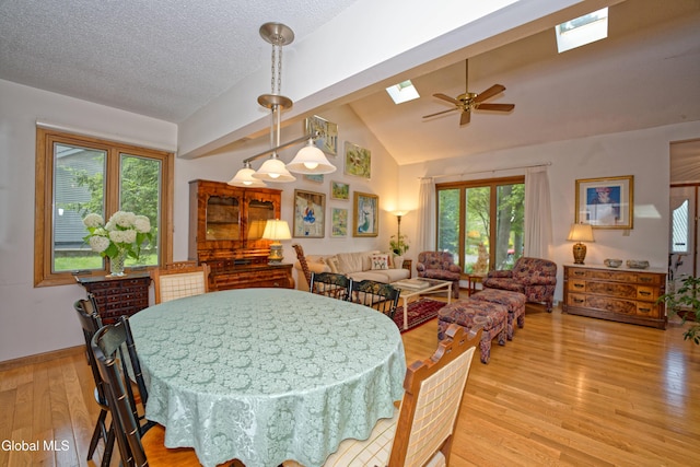 35 Warwick Way, Niskayuna, NY 12309 - dining area featuring a skylight, light wood-style flooring, ceiling fan, plenty of natural light, and a textured ceiling