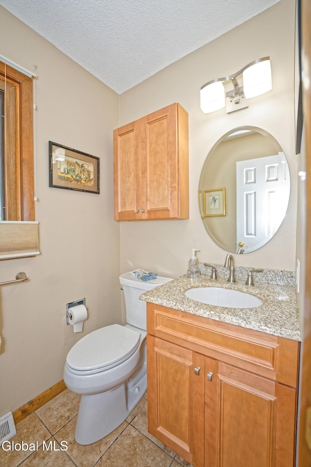 35 Warwick Way, Niskayuna, NY 12309 - half bathroom featuring vanity, tile patterned flooring, and a textured ceiling