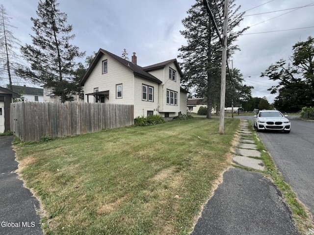 1822 7th St, Rensselaer, NY 12144 - view of property exterior featuring a chimney
