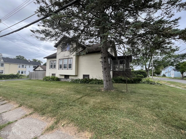 1822 7th St, Rensselaer, NY 12144 - view of property exterior with a sunroom