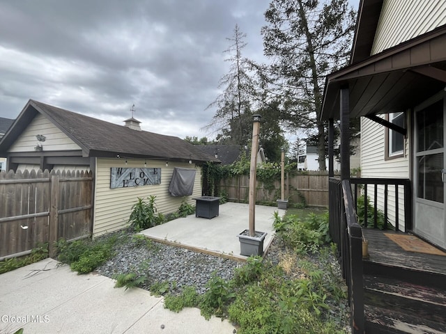 1822 7th St, Rensselaer, NY 12144 - fenced backyard featuring a patio area