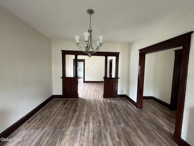 1822 7th St, Rensselaer, NY 12144 - unfurnished dining area with a chandelier and dark wood-style flooring