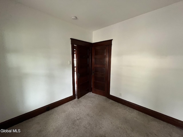 1822 7th St, Rensselaer, NY 12144 - carpeted spare room featuring baseboards