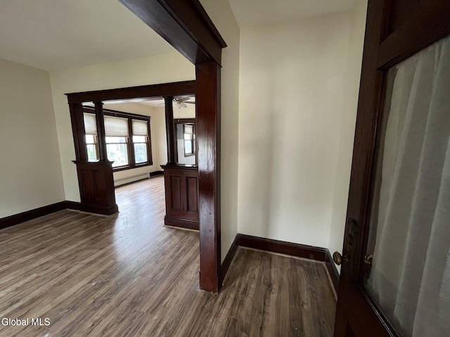 1822 7th St, Rensselaer, NY 12144 - hallway featuring wood finished floors and baseboard heating