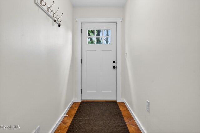 55 Crescent Ave, Saratoga Springs, NY 12866 - entryway featuring tile patterned floors and baseboards