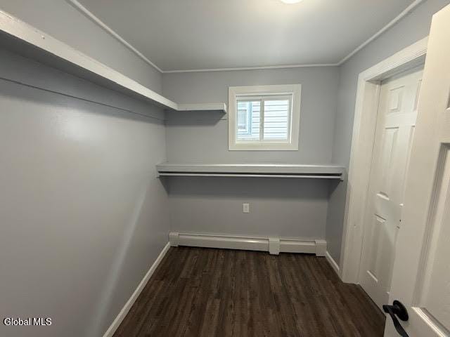 1338 Crane St, Schenectady, NY 12303 - walk in closet featuring wood finished floors and baseboard heating