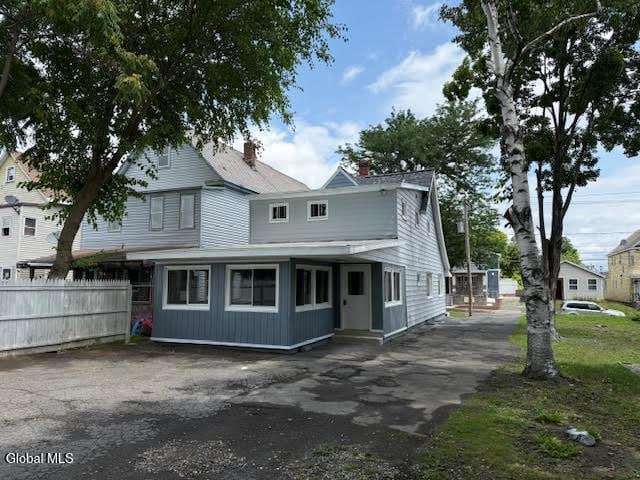 1338 Crane St, Schenectady, NY 12303 - view of front of property with a chimney and driveway