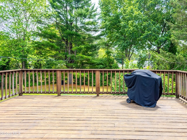 19 Drawbridge Dr, Guilderland, NY 12203 - deck featuring area for grilling and view of scattered trees