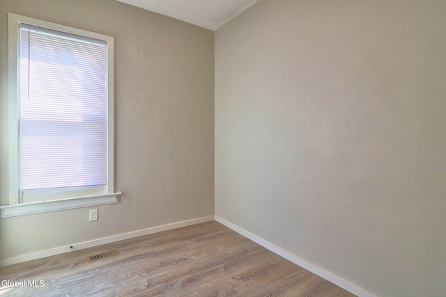 421 Summit Ave, Schenectady, NY 12307 - empty room featuring wood finished floors and healthy amount of natural light