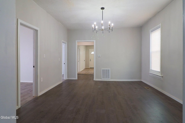 421 Summit Ave, Schenectady, NY 12307 - unfurnished dining area with a chandelier and dark wood-type flooring