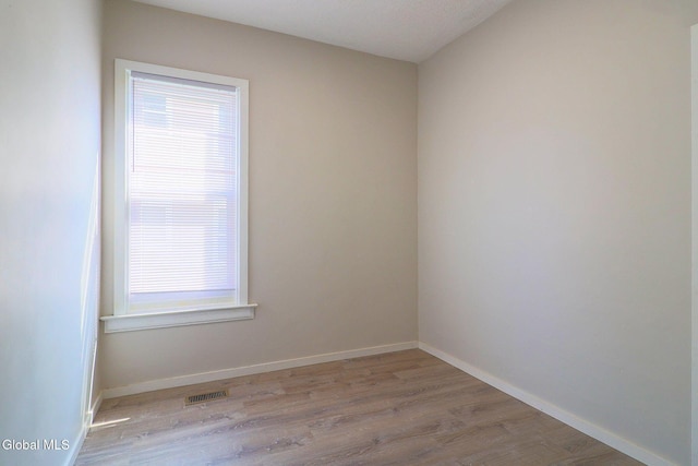 421 Summit Ave, Schenectady, NY 12307 - empty room with wood finished floors and baseboards