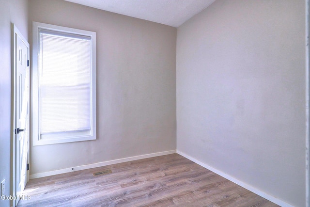 421 Summit Ave, Schenectady, NY 12307 - spare room featuring wood finished floors and baseboards