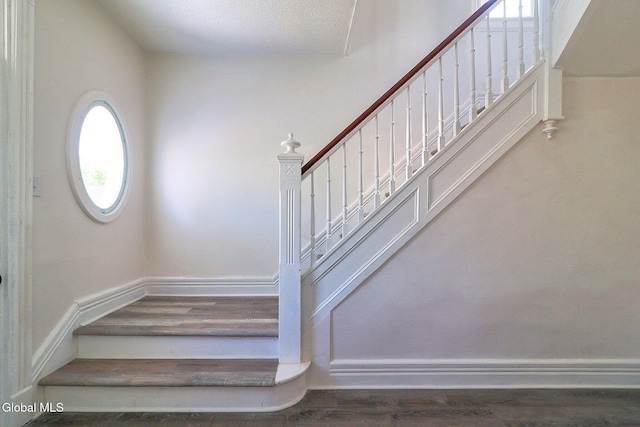 421 Summit Ave, Schenectady, NY 12307 - stairs with baseboards and wood finished floors