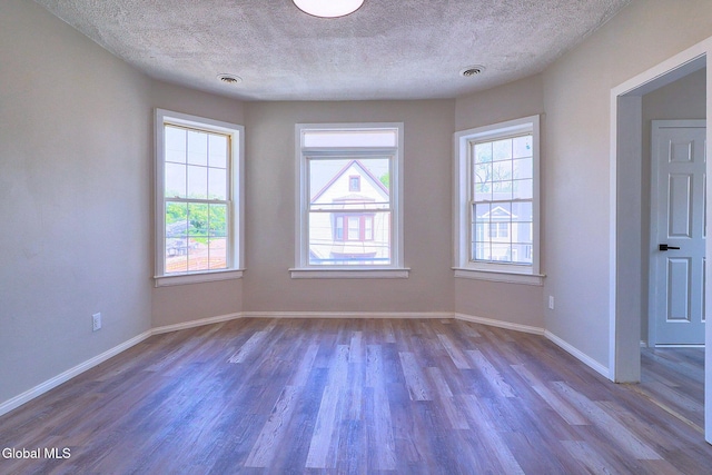 421 Summit Ave, Schenectady, NY 12307 - unfurnished room featuring dark wood-type flooring and a textured ceiling