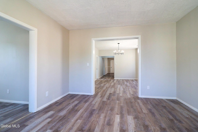 421 Summit Ave, Schenectady, NY 12307 - spare room with a chandelier and wood finished floors