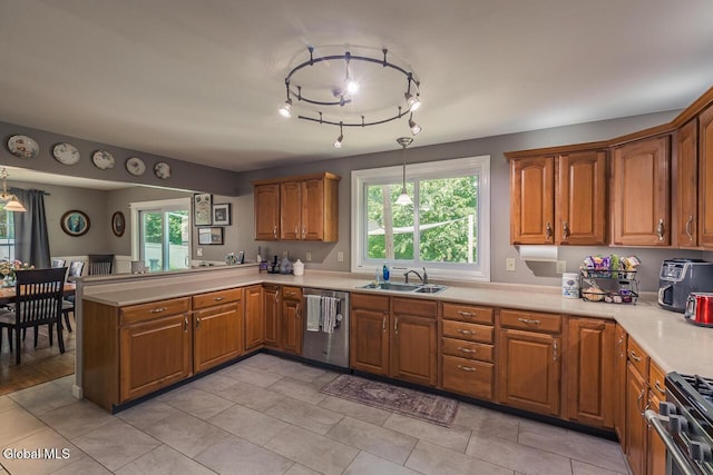 54 S Whitney Rd, Stillwater, NY 12866 - kitchen with brown cabinets, plenty of natural light, light countertops, and a peninsula