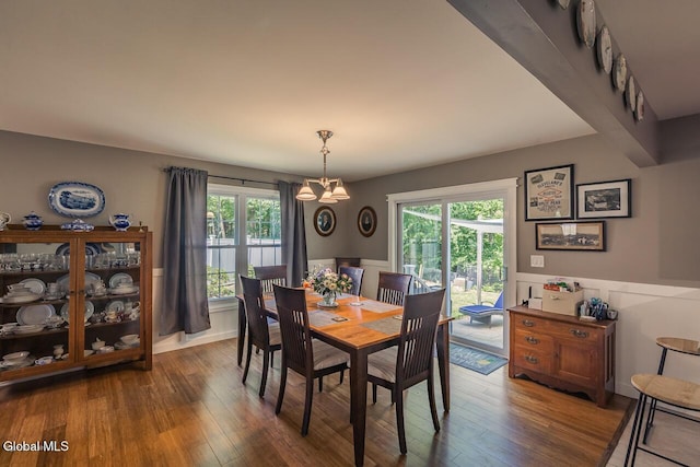 54 S Whitney Rd, Stillwater, NY 12866 - dining space with hardwood / wood-style flooring, plenty of natural light, a chandelier, and a wainscoted wall