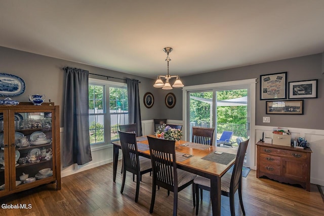 54 S Whitney Rd, Stillwater, NY 12866 - dining space with a chandelier, dark wood-type flooring, and a wainscoted wall