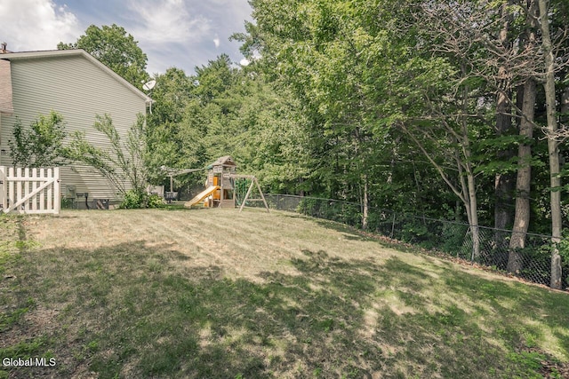 54 S Whitney Rd, Stillwater, NY 12866 - fenced backyard featuring a playground