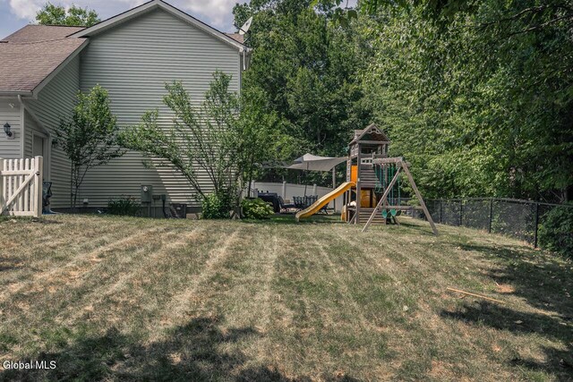 54 S Whitney Rd, Stillwater, NY 12866 - fenced backyard featuring a playground