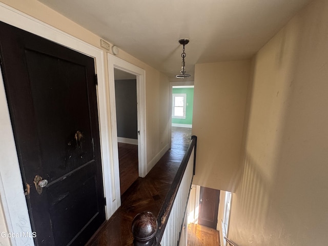 261 Altamont Ave, Schenectady, NY 12304 - hallway featuring an upstairs landing and wood finished floors