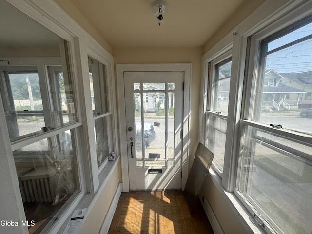 261 Altamont Ave, Schenectady, NY 12304 - unfurnished sunroom with healthy amount of natural light and wood finished floors