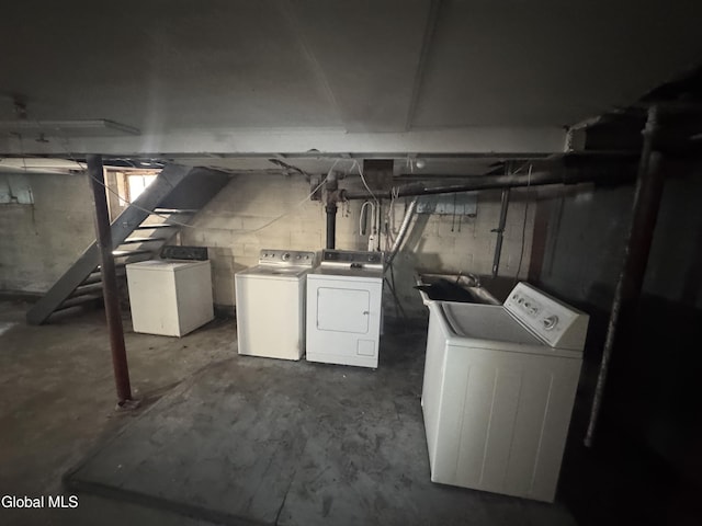 261 Altamont Ave, Schenectady, NY 12304 - below grade area featuring washer and clothes dryer and a sink