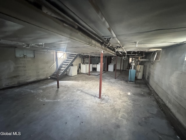 261 Altamont Ave, Schenectady, NY 12304 - unfinished below grade area with stairs, gas water heater, and a heating unit