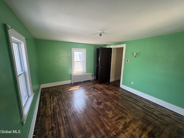 261 Altamont Ave, Schenectady, NY 12304 - empty room with radiator and baseboards