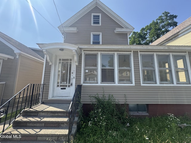 261 Altamont Ave, Schenectady, NY 12304 - view of front of property featuring a sunroom