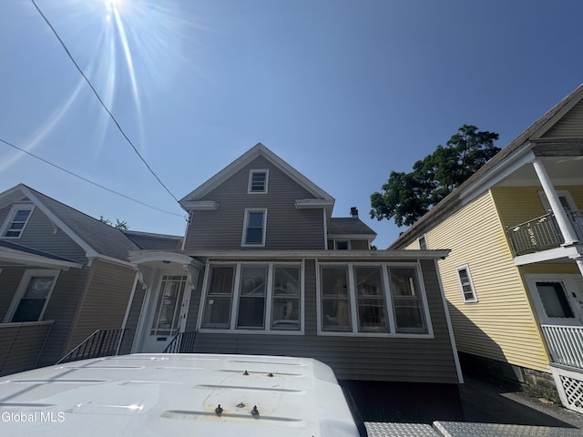 261 Altamont Ave, Schenectady, NY 12304 - back of house with a sunroom