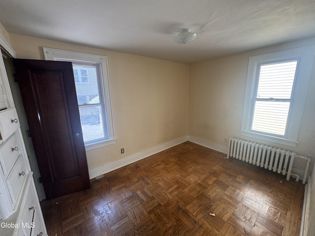 261 Altamont Ave, Schenectady, NY 12304 - empty room with radiator and baseboards