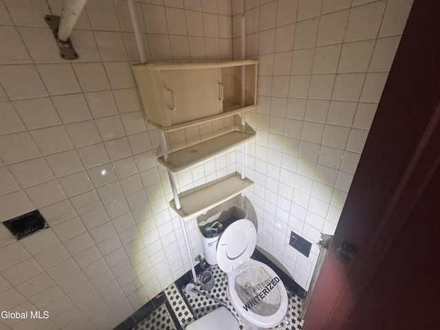 261 Altamont Ave, Schenectady, NY 12304 - bathroom with tile walls, tile patterned flooring, and pet washing station