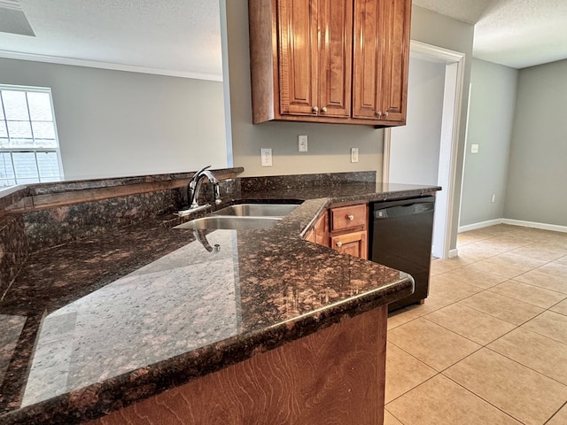 5341 Branch Pt, Valdosta, GA 31605 - kitchen with black dishwasher, dark stone countertops, light tile patterned floors, a textured ceiling, and brown cabinetry