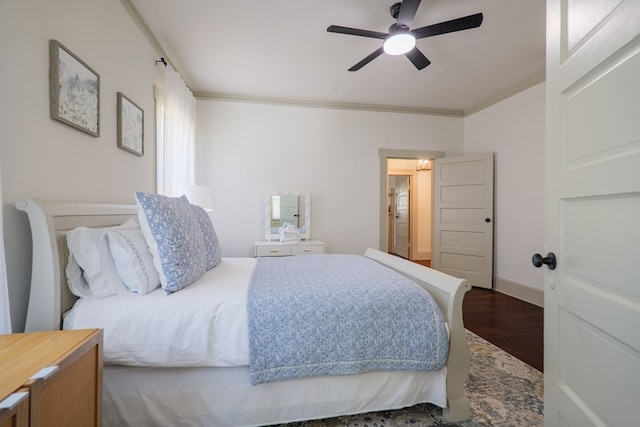 1611 N Patterson St, Valdosta, GA 31602 - bedroom featuring wood finished floors, crown molding, and a ceiling fan