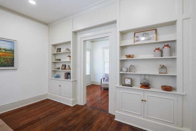 1611 N Patterson St, Valdosta, GA 31602 - hall featuring dark wood-type flooring, built in features, and crown molding