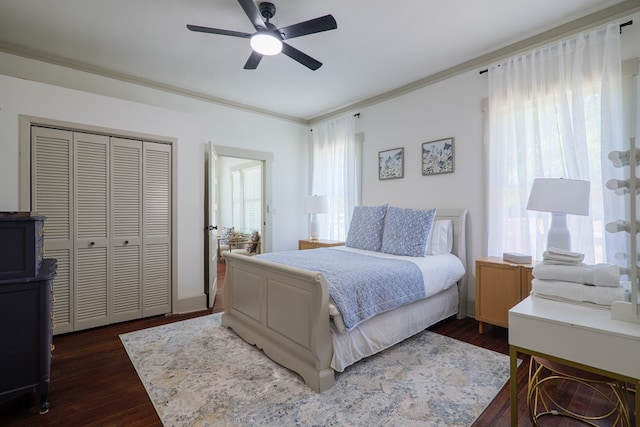 1611 N Patterson St, Valdosta, GA 31602 - bedroom featuring a closet, dark wood-type flooring, crown molding, and a ceiling fan
