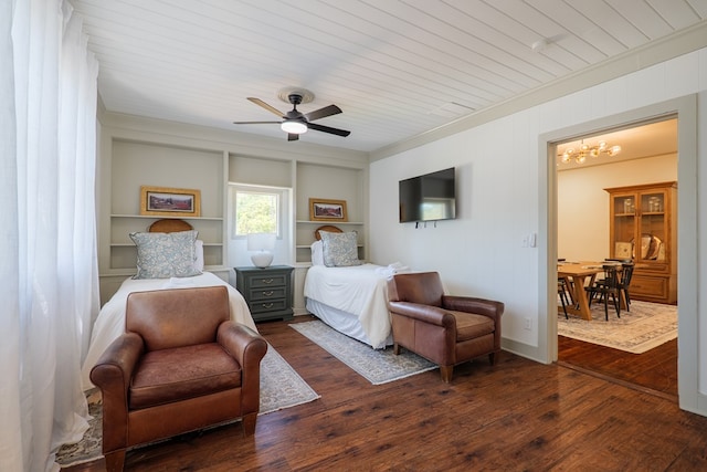 1611 N Patterson St, Valdosta, GA 31602 - bedroom featuring dark wood-style flooring, ornamental molding, and a ceiling fan