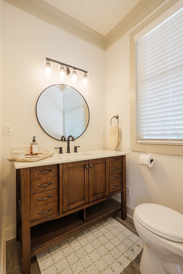 1611 N Patterson St, Valdosta, GA 31602 - bathroom with crown molding, vanity, and wood finished floors