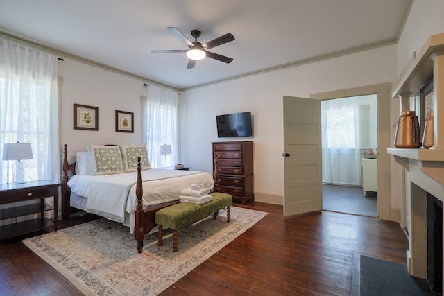 1611 N Patterson St, Valdosta, GA 31602 - bedroom featuring crown molding, dark wood-style floors, and a ceiling fan