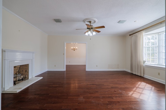 unfurnished living room featuring a textured ceiling, crown molding, and dark hardwood / wood-style floors