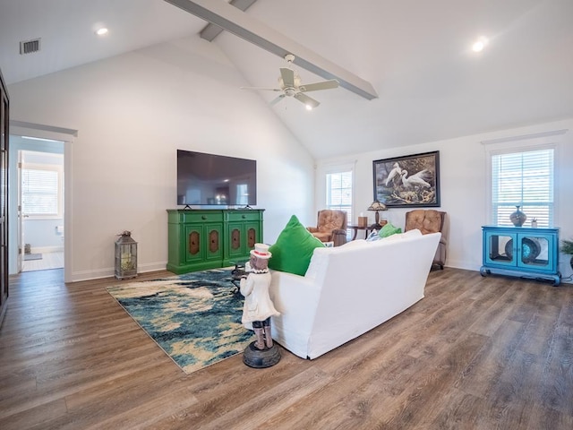 living room featuring ceiling fan, high vaulted ceiling, wood finished floors, baseboards, and beamed ceiling