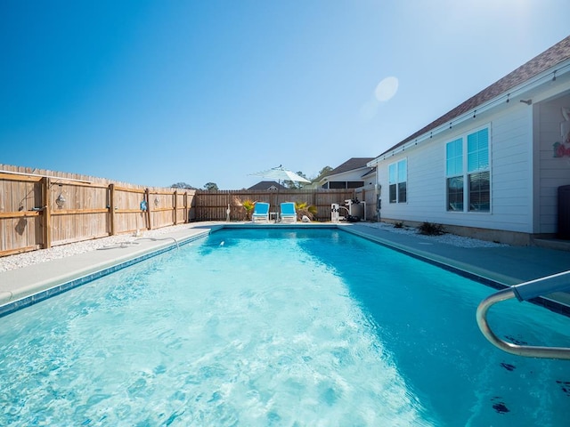 view of pool featuring a fenced backyard and a fenced in pool