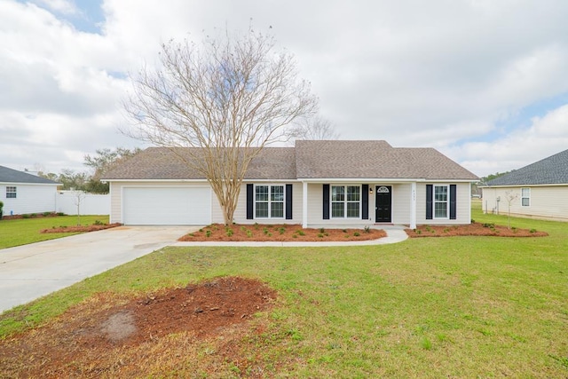 ranch-style home featuring driveway, a shingled roof, a garage, and a front yard