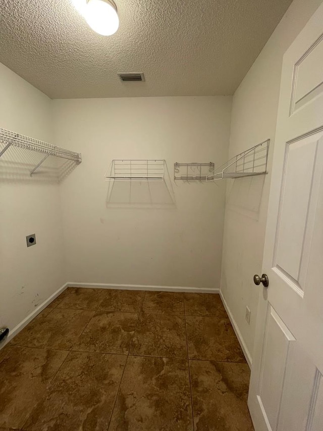 4331 Summerlin Dr, Valdosta, GA 31605 - walk in closet with visible vents and tile patterned floors