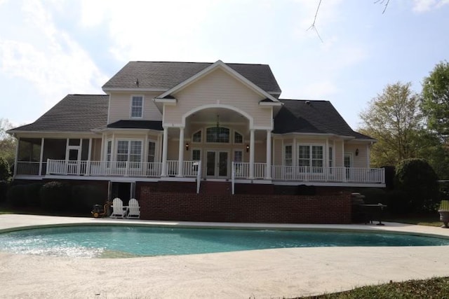 back of property featuring a patio and french doors