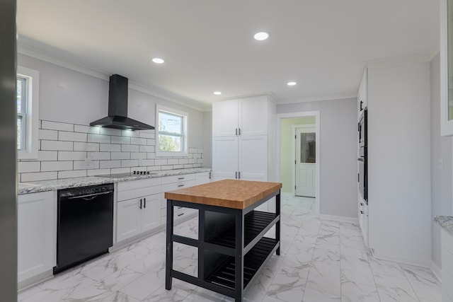 kitchen with ventilation hood, crown molding, black appliances, white cabinetry, and backsplash