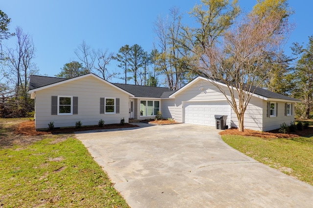 ranch-style house with a front yard, concrete driveway, and an attached garage