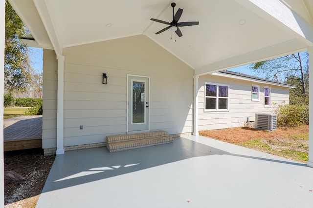 exterior space with a patio area, central AC, and ceiling fan