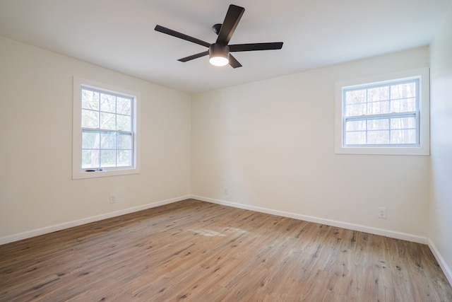 unfurnished room with light hardwood / wood-style floors and ceiling fan